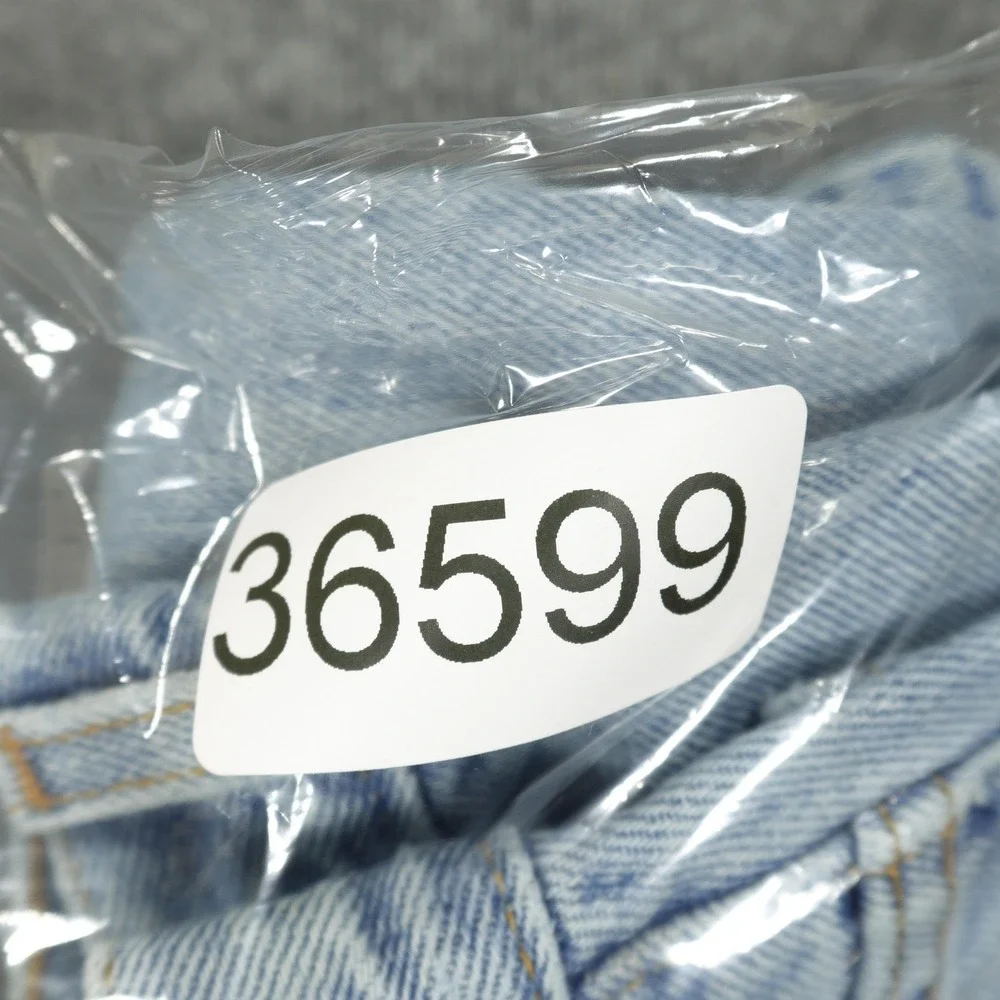 Vintage Levis 560 Jeans Mens 36x26 Light Wash Blue Relaxed Tapered Raw Hem